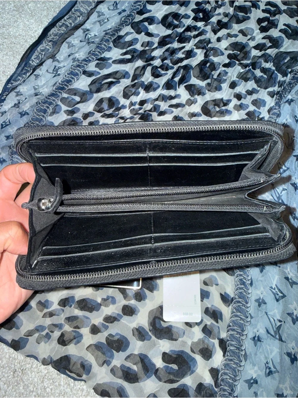 Authentic CHANEL Black Caviar Leather Zip-Around Wallet with Embossed CC